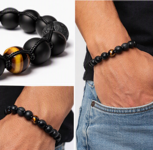 Corven Lava, black agate and tiger eye bead bracelet by T.M.J, featuring knotted macrame design with natural stone beads.