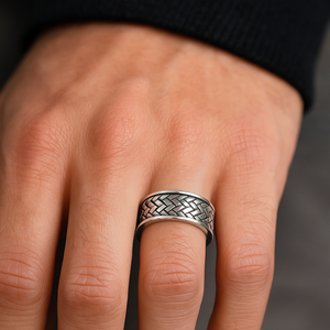 Cudworth Sterling Silver Ring with Celtic woven centre pattern.
