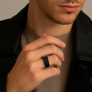 Men wearing men's polish finish 316L stainless steel dress ring in black.