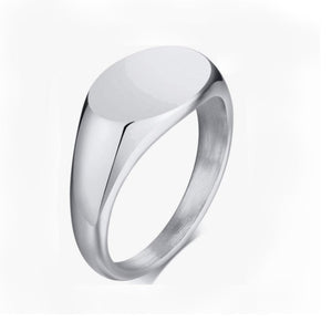 Sleek satin finish stainless steel oval signet pinky ring with minimalist design and high-polished shine.