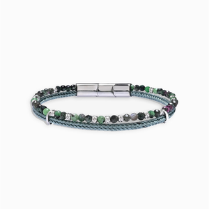 T.M.J African turquoise faceted bead bracelet with blue braided cord, featuring vibrant turquoise beads and a woven cord design.