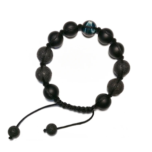 Lava Agate and Tiger Eye beaded bracelet by T.M.J, featuring natural stone beads and intricate macramé cord.