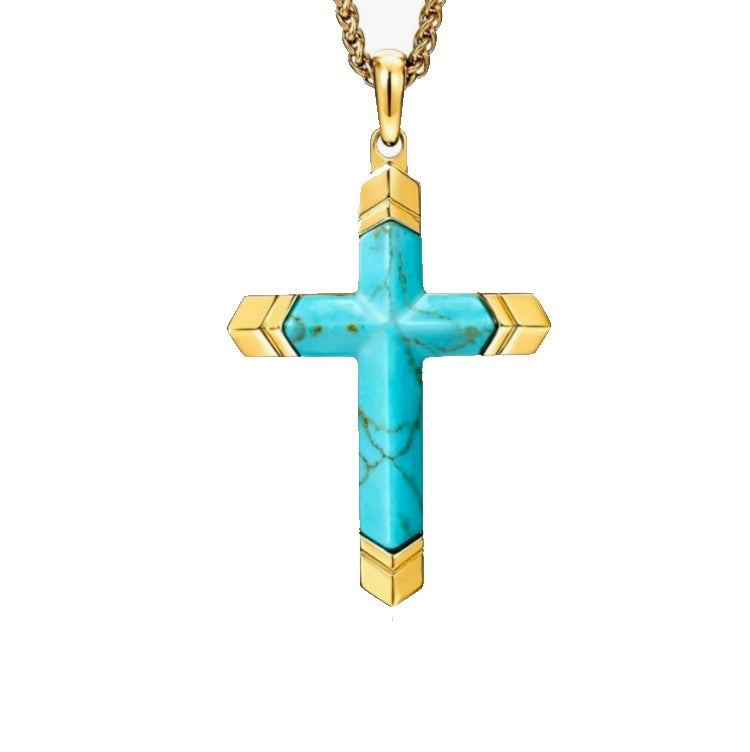 Marisol turquoise cross pendant on gold PVD stainless steel from Cudworth, featuring a detailed cross design with turquoise accents.