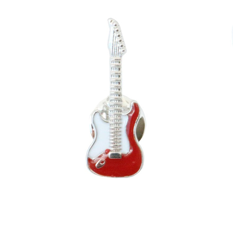 Dalaco gold, silver, and enamel guitar lapel pin, a stylish tie pin with musical guitar design on a white background.