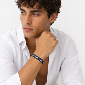 T.M.J Kairos Sodalite bead bracelet with silver accents, showcasing polished blue stones and delicate silver details.