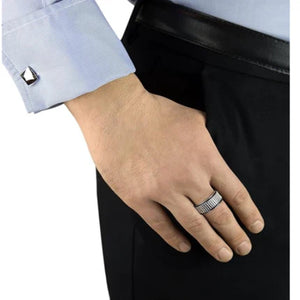 Hoxton silver ring for men worn on a hand with a blue shirt and black pants