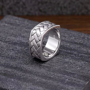 Hoxton sterling silver herringbone collection ring with textured, woven pattern, showcasing elegant silver jewelry design.