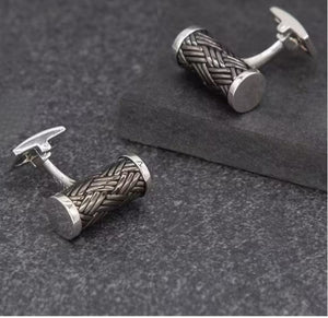 Hoxton sterling silver basket weave cufflinks with cylindrical design on dark textured surface