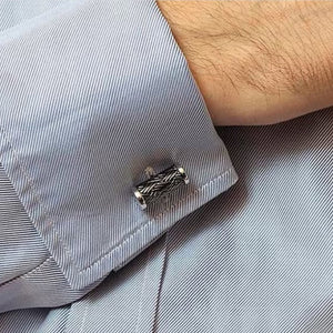 Hoxton sterling silver basket weave cufflinks on a light blue dress shirt cuff