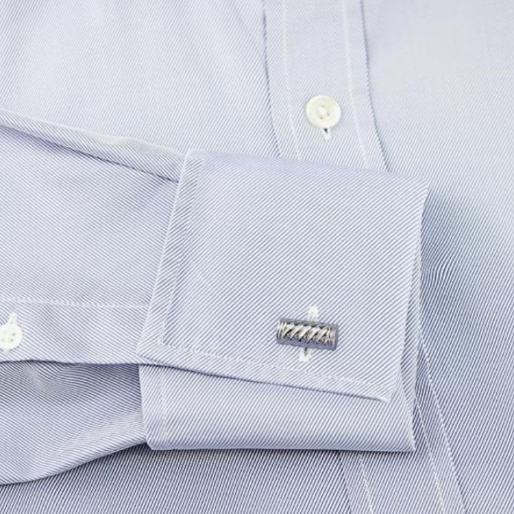 Hoxton sterling silver twist cufflinks on a light blue dress shirt cuff