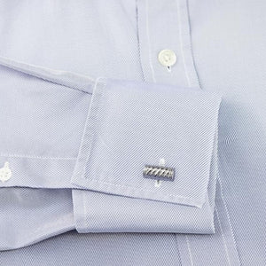 Hoxton sterling silver twist cufflinks on a light blue dress shirt cuff