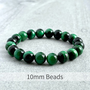 Green Tiger Eye bead bracelet with 10mm beads and stainless steel spacer.