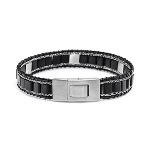 T.M.J Kairos black onyx bead bracelet with silver accents, featuring silver lock and polished black onyx beads for a stylish look.