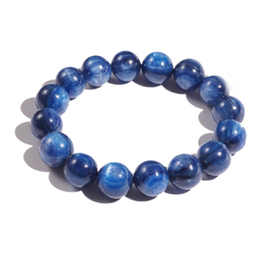Dark blue Brazilian Kyanite crystal bead bracelet by T.M.J featuring 6mm, 8mm, 10mm, and 12mm beads on a stretch cord.