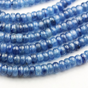 Dark blue Brazilian Kyanite crystal bead bracelet by T.M.J, featuring 6mm, 8mm, 10mm, and 12mm beads on a stretch cord.
