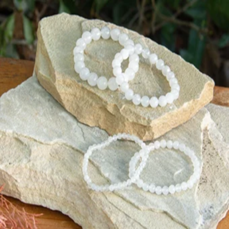 White Jadeite bead bracelet by T.M.J, 6-12mm round beads, 17cm length, stylish beaded jewelry accessory.