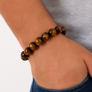 Brown Tiger Eye beaded bracelet featuring 12mm round beads from T.M.J, stylish and natural gemstone jewelry.