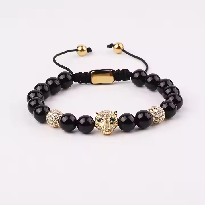 Natural stone CZ pave leopard macrame bracelet with black agate beads, featuring intricate beadwork and stylish design.