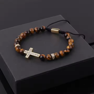 Natural 6mm stone beaded CZ cross charm macrame bracelet by T.M.J with brown beads and adjustable cord.