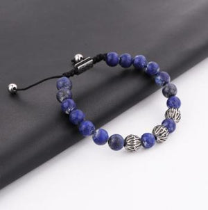 T.M.J bead bracelet featuring brown tiger eye stones, macramé design, stainless steel spacer beads, and natural stone accents.