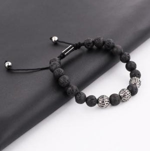 T.M.J bead bracelet featuring brown tiger eye stones, macramé design, stainless steel spacer beads, and natural stone accents.
