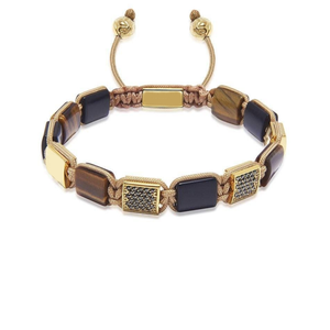 T.M.J Eye of Dharma flat bead bracelet with matte black onyx and brown tiger eye stones, showcasing a stylish beaded jewelry design.