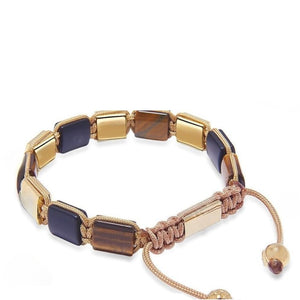 T.M.J Eye of Dharma Flatbead Collection beaded bracelet with matte onyx and brown tiger eye stones.