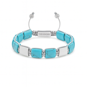 Turquoise and silver Eye of Dharma flatbead bead bracelet from T.M.J's Flatbead Collection, featuring detailed bead design.