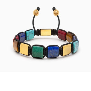 T.M.J Eye of Dharma Flatbead Collection beaded bracelet with turquoise, tiger eye, lapis lazuli, and gold accents.