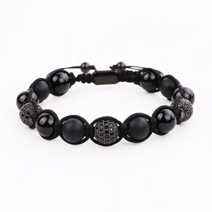Black Onyx CZ crystal bead bracelet with macramé design, featuring protective stones and elegant craftsmanship by T.M.J.