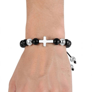 Sentinel Onyx beaded cross bracelet by T.M.J, stainless steel with black onyx beads and a cross charm, stylish jewelry accessory.