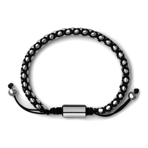 T.M.J Crimson Weave SteelLink bead bracelet with braided black cord, featuring gold-tone steel links and intricate woven design.