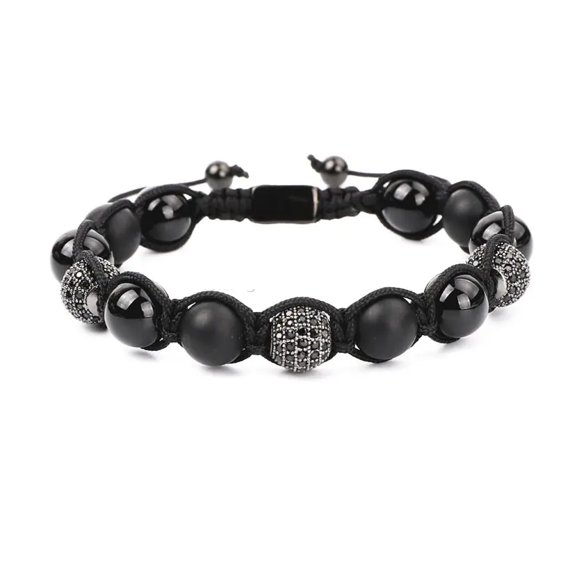 T.M.J natural stone onyx and tiger eye beaded macrame bracelet featuring matte finish beads and intricate knot detail.