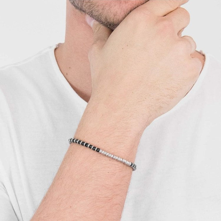 Natural stone beaded bracelet for men with stainless steel accents, featuring tiger eye beads and a stylish, masculine design.