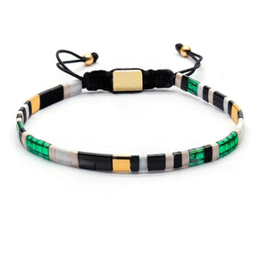 Tila Link Macrame Bracelet by T.M.J featuring white gold Miyuki Tila beads and intricate knotting design.