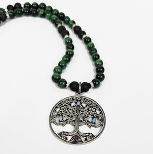 8mm green tiger eye and lava beaded necklace with silver Tree of Life pendant by T.M.J, showcasing intricate stone details and craftsmanship.