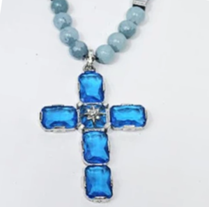 Large silver cross pendant with Austrian crystals on aquamarine beaded necklace by T.M.J, featuring detailed craftsmanship.