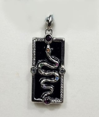 Silver enamel snake dog tag pendant on a turquoise beaded necklace, featuring a detailed T.M.J beaded necklace design.