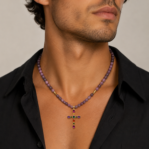 Silver and gold plated beaded necklace featuring a cross pendant with colored cubic zirconia and 6mm lepidolite beads.