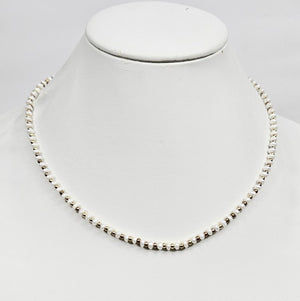 Mini beaded necklace by T.M.J featuring pearls and stainless steel spacer beads, 45cm silver-toned jewelry accessory.
