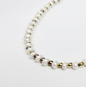 Mini beaded necklace by T.M.J featuring pearls and stainless steel spacer beads, 45cm silver-toned jewelry accessory.