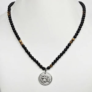 Beaded stainless steel necklace with Nemean Lion pendant inspired by Greek mythology, featuring intricate pendant details.