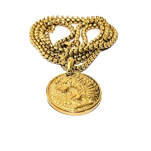 Gold pendant of the Nemean Lion from Greek mythology on a beaded necklace, featuring detailed lion imagery and ancient design elements.