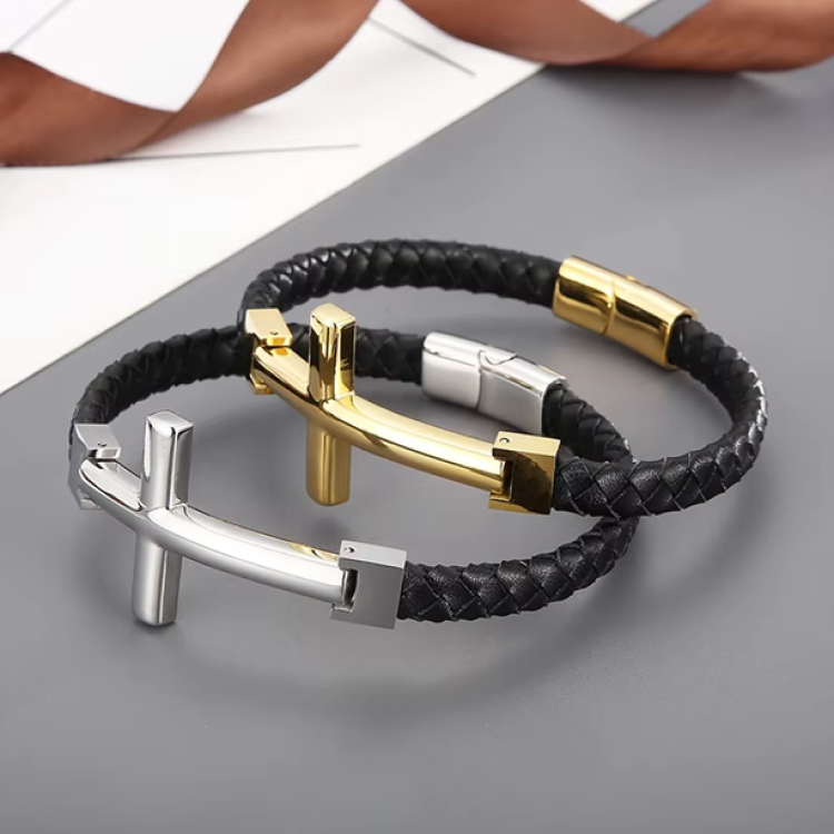 Gold flat braided leather bracelet with a large cross charm, stylish T.M.J leather bracelet for men and women.