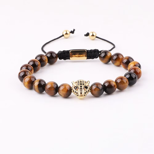 High quality macrame bracelet with 8mm natural stone tiger eye beads, CZ panther charm, by T.M.J, featuring green tones.