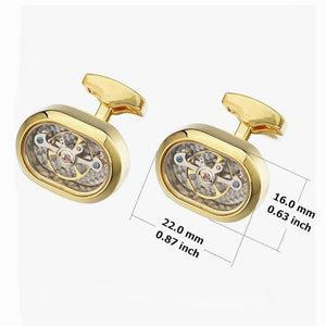 Handmade gold plated watch movement cufflinks featuring intricate mechanical watch components, crafted by T.M.J.