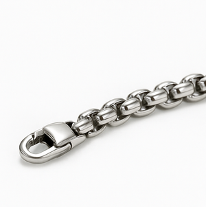 Stainless steel ID bracelet by T.M.J with gold twisted wire insert, featuring a sleek metal design and secure clasp.