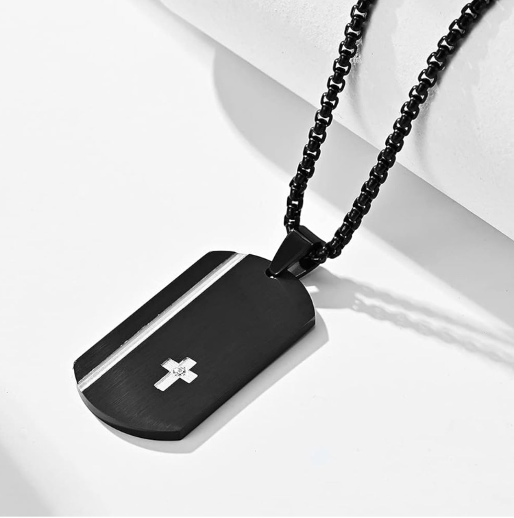 Stainless steel cross tag pendant on black chain, T.M.J brand, with detailed cross design and sleek chain for men's jewelry.