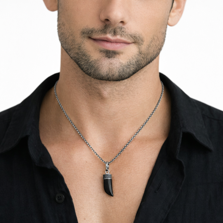 Antique stainless steel pendant featuring a polished agate shark tooth, designed by T.M.J, showcasing natural stone details.