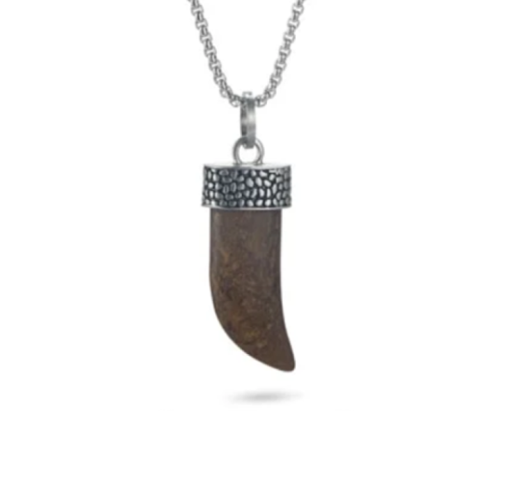 Antique stainless steel pendant with bronzite shark tooth design, crafted by T.M.J, featuring a detailed and textured pendant shape.